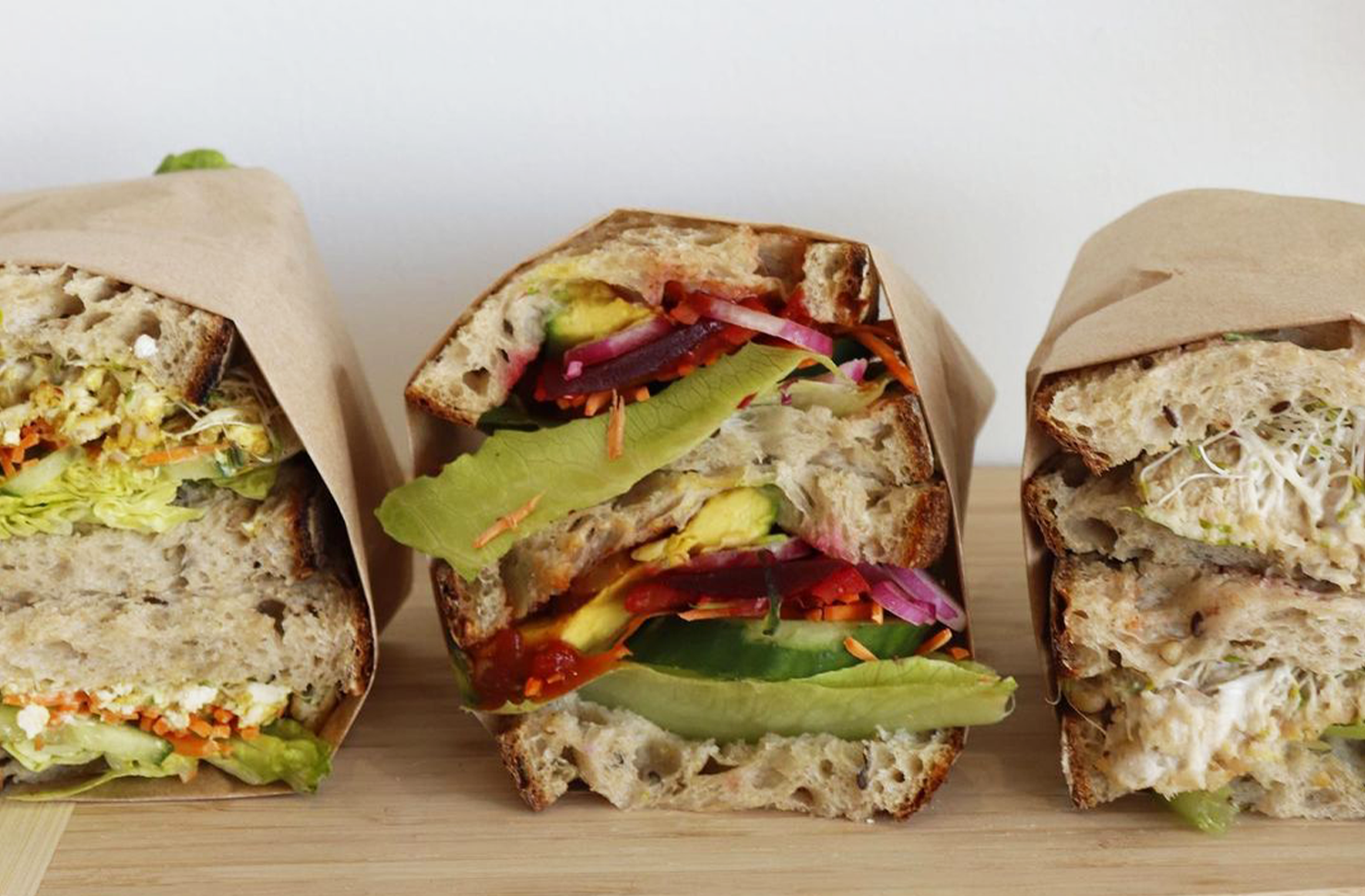 three stacked fresh sandwiches