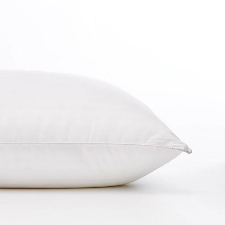 Half image of white pillow