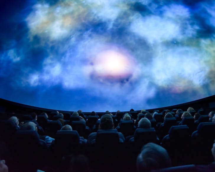 People sit in awe at the Perpetual Guardian Planetarium. 