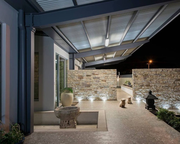 An exterior view of the main house entrance for Private Self-Contained Villa one of the best Darwin Airbnbs
