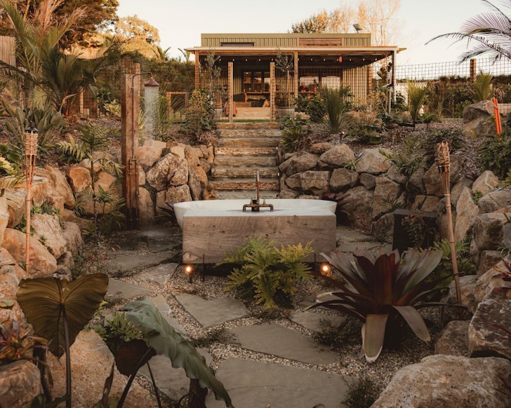 The outdoor bath in front of Pukepohatu Retreat best romantic stays New Zealand