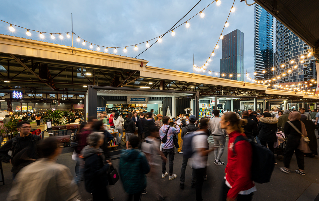 An outdoor market Melbourne with people walking. 