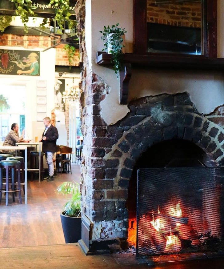 Image of the fireplace at The Queens