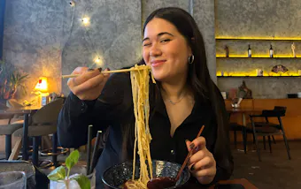 Woman eating ramen