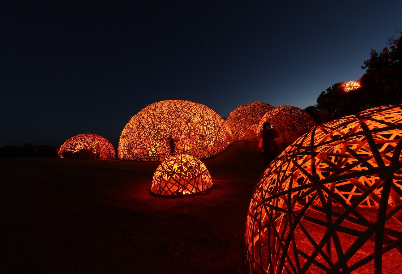A collection of orange-lit domes.