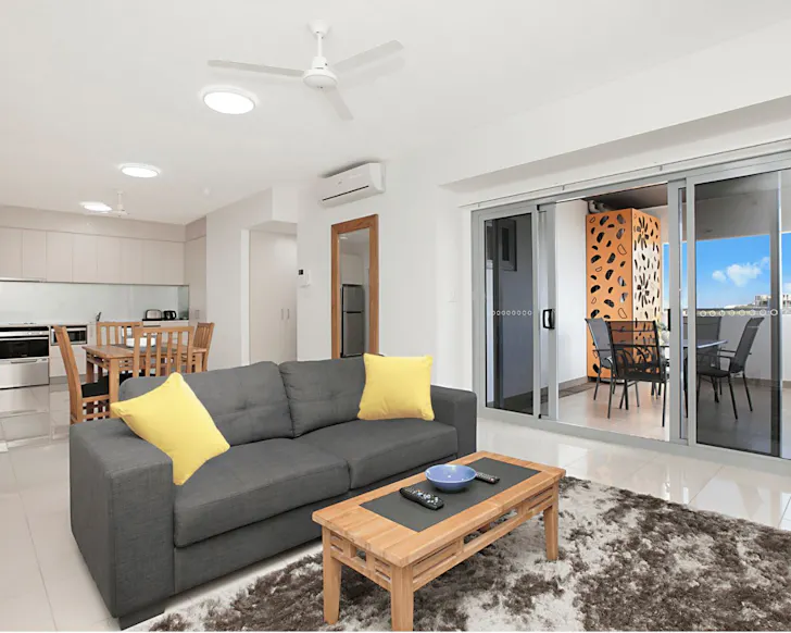 A living and kitchen space of a suite at Ramada Suites by Wyndham Zen Quarter Darwin one of the best Darwin hotels