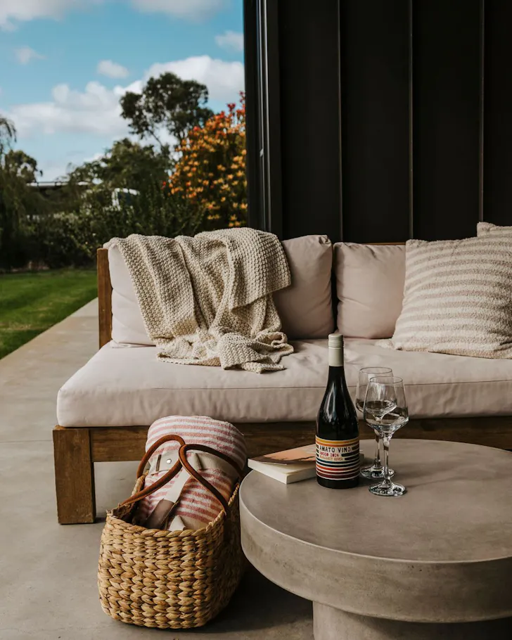 A cosy chair in the garden at Redgate Studio one of the best WA Airbnb stays 