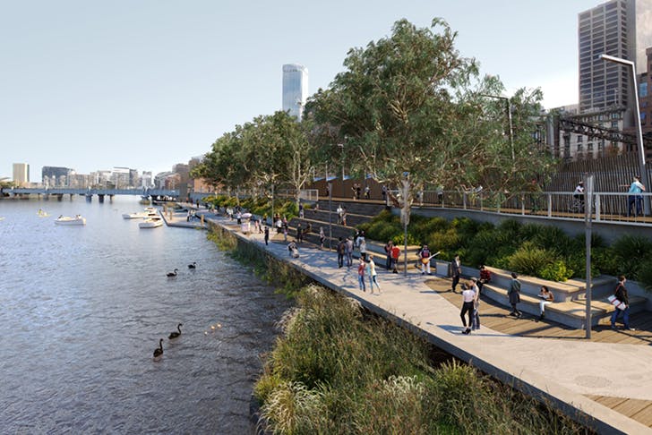 A concept shot of the Yarra river on a clear day with dense green shrubs and plants surrounding the walkway