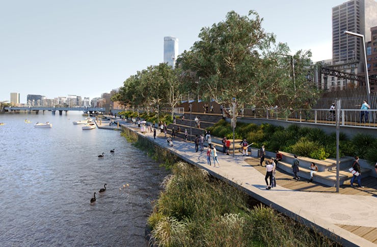 A concept shot of the Yarra river on a clear day with dense green shrubs and plants surrounding the walkway