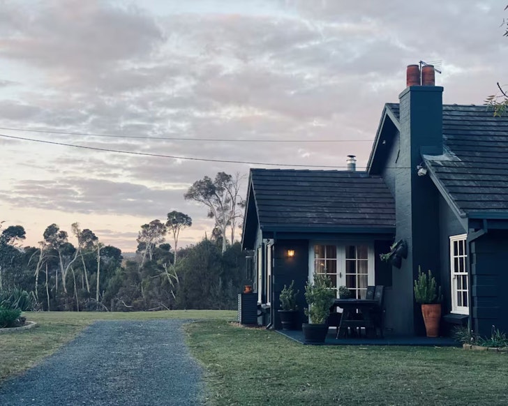 The black exterior of Rivers Edge Homestead one of the best kid-friendly Airbnbs in Australia
