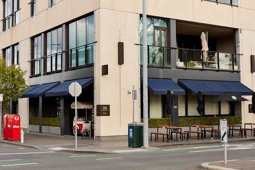 The exterior of a restaurant shot from the street.
