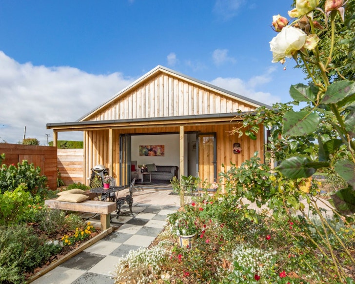 The view of Rose Cottage and her garden best romantic stays near Auckland