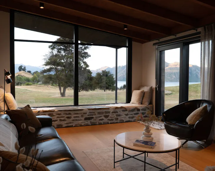 The living space at Roys Peak Farmhouse best lakefront Airbnbs NZ