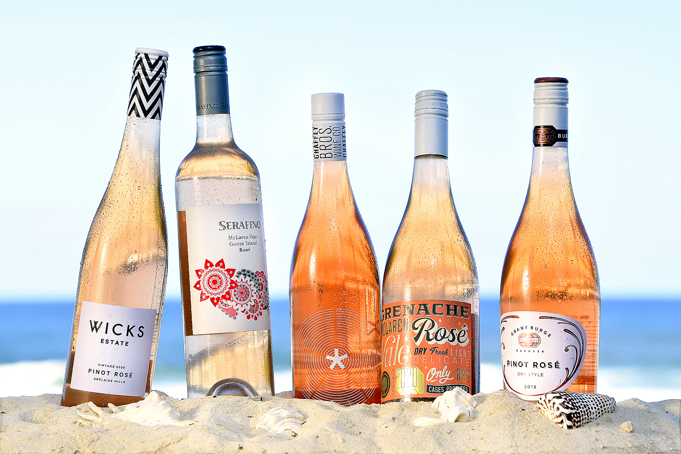 a line-up of rose bottles