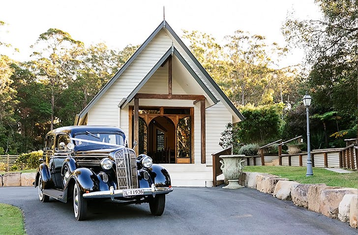 sunshine coast white wedding chapel with car