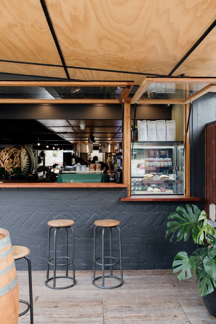 a bar with two stools