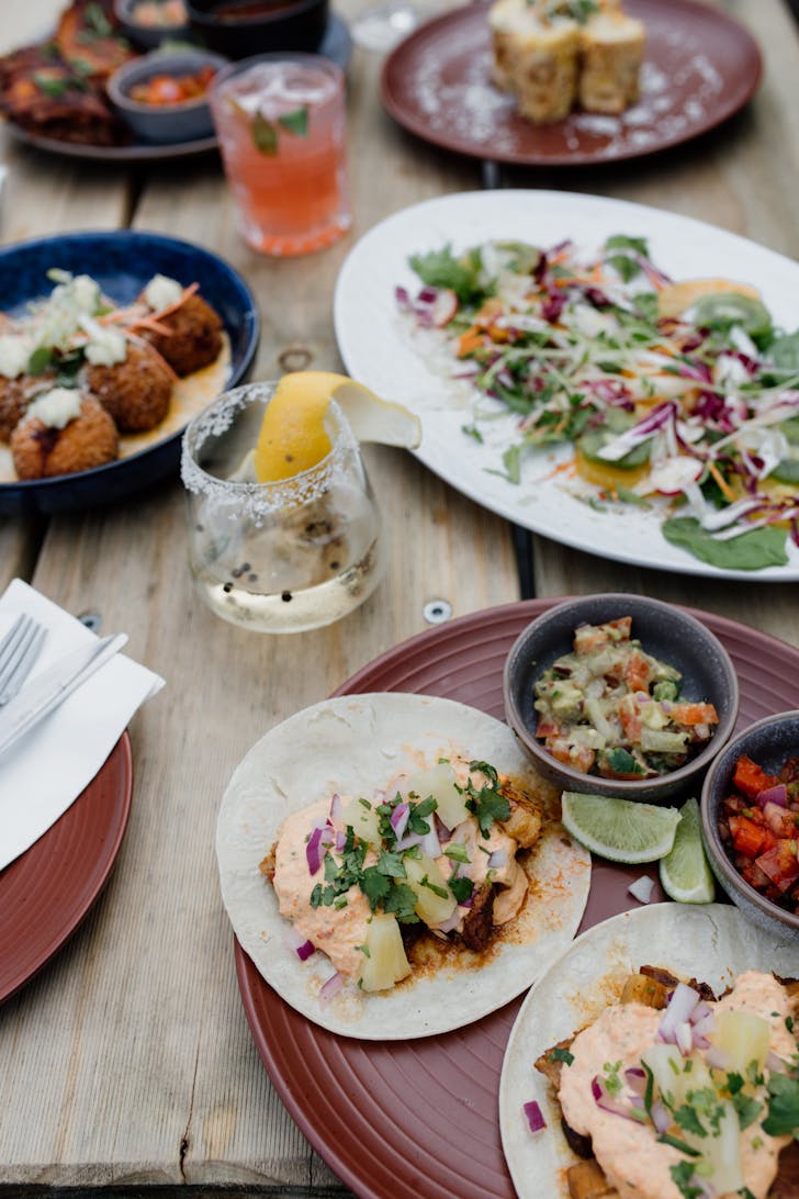 a table filled with food and drinks