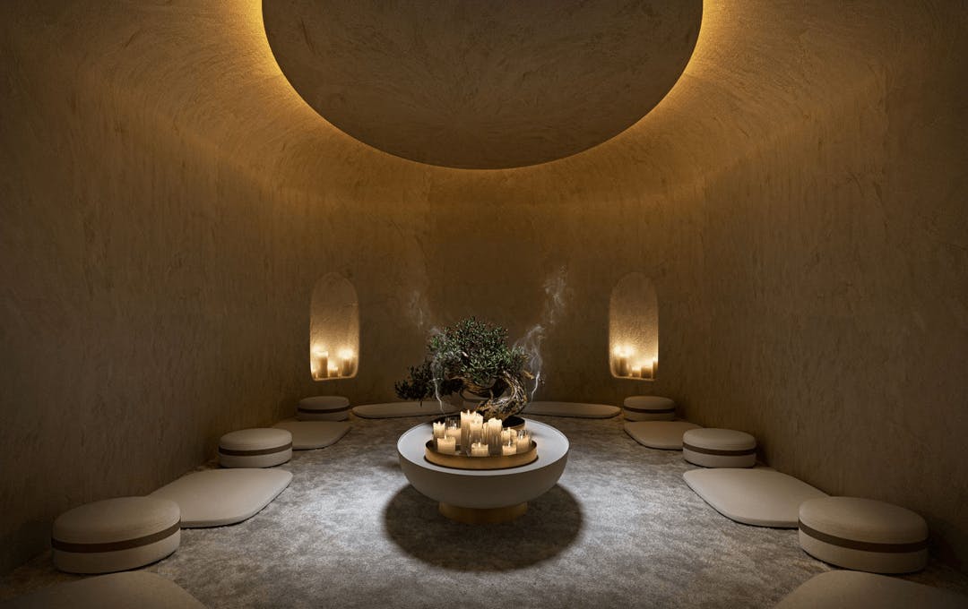Inside a meditation room with pillows on the floor at Saint Haven.