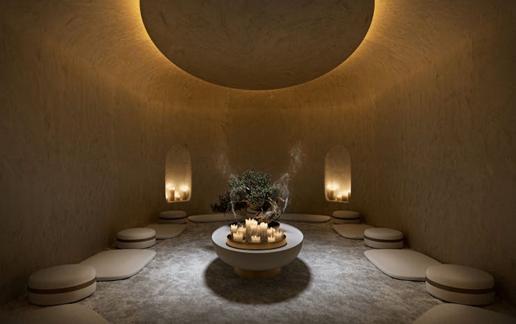 Inside a meditation room with pillows on the floor at Saint Haven.