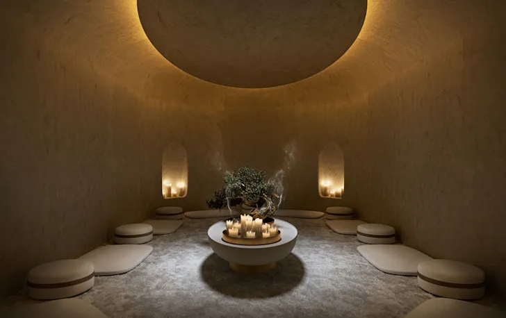 Inside a meditation room with pillows on the floor at Saint Haven.