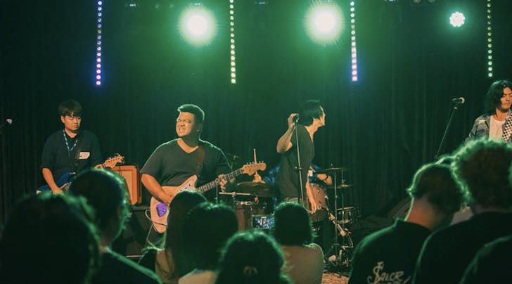 Band singing to audience