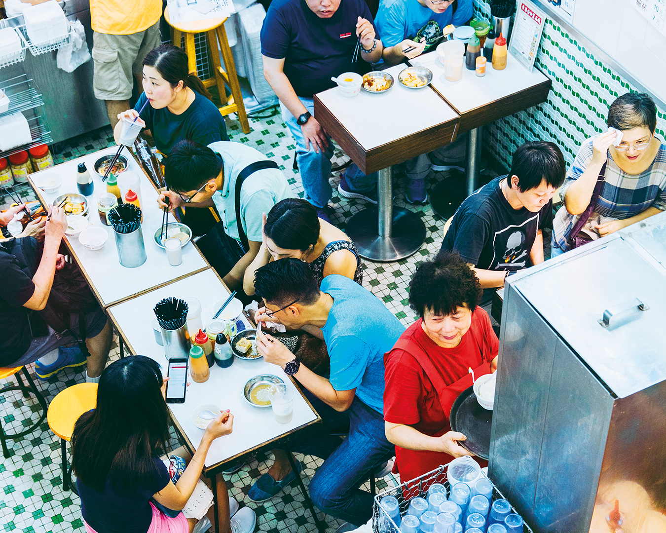 Bird's eye view of people eating in a restaurant in Hong Kong