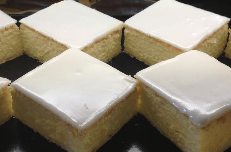 A tray of rectangle-cut vanilla slices.