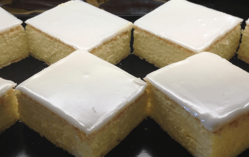 A tray of rectangle-cut vanilla slices.