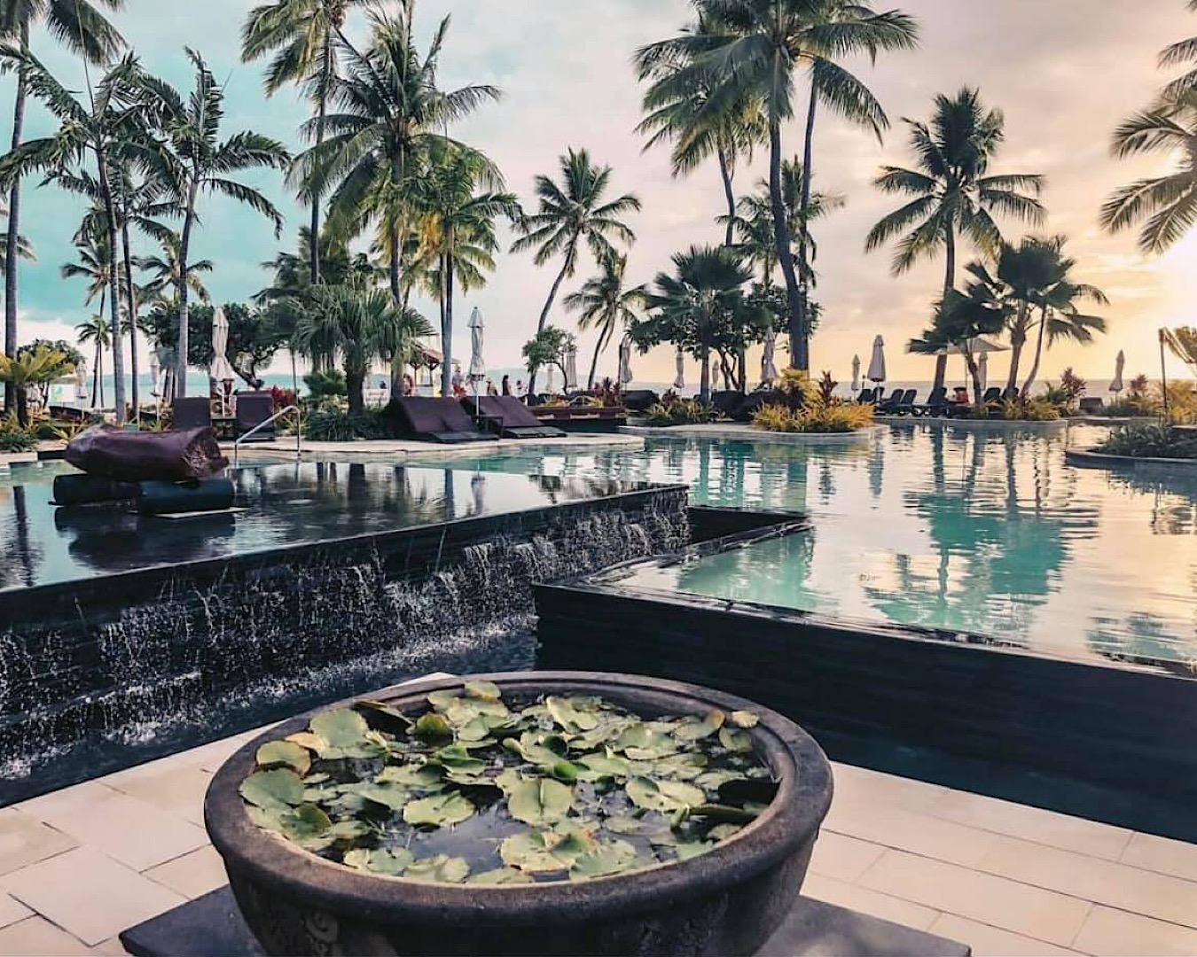 A magical pool scene at Sheraton Fiji Golf & Beach Resort on a moody sky. 