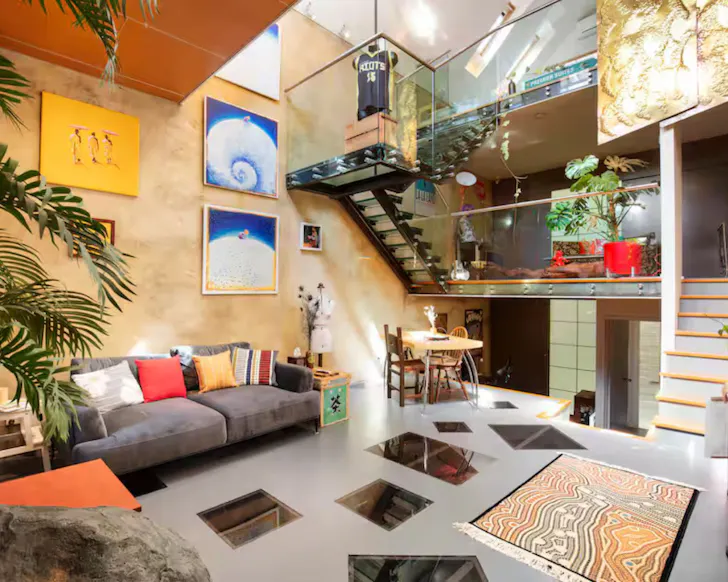 The colourful living space at Sherlock's Home one of the best Airbnbs in Melbourne