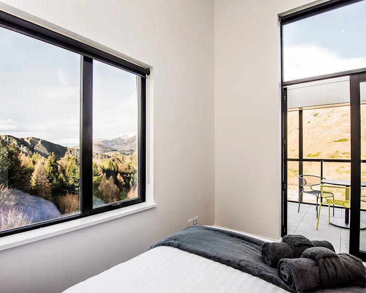 Two windows offer two different views at the Shotover Riverside penthouse.
