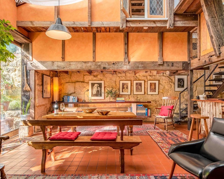 The rustic living space leading to the outdoors at Silver Street Studio one of the best Perth Airbnbs