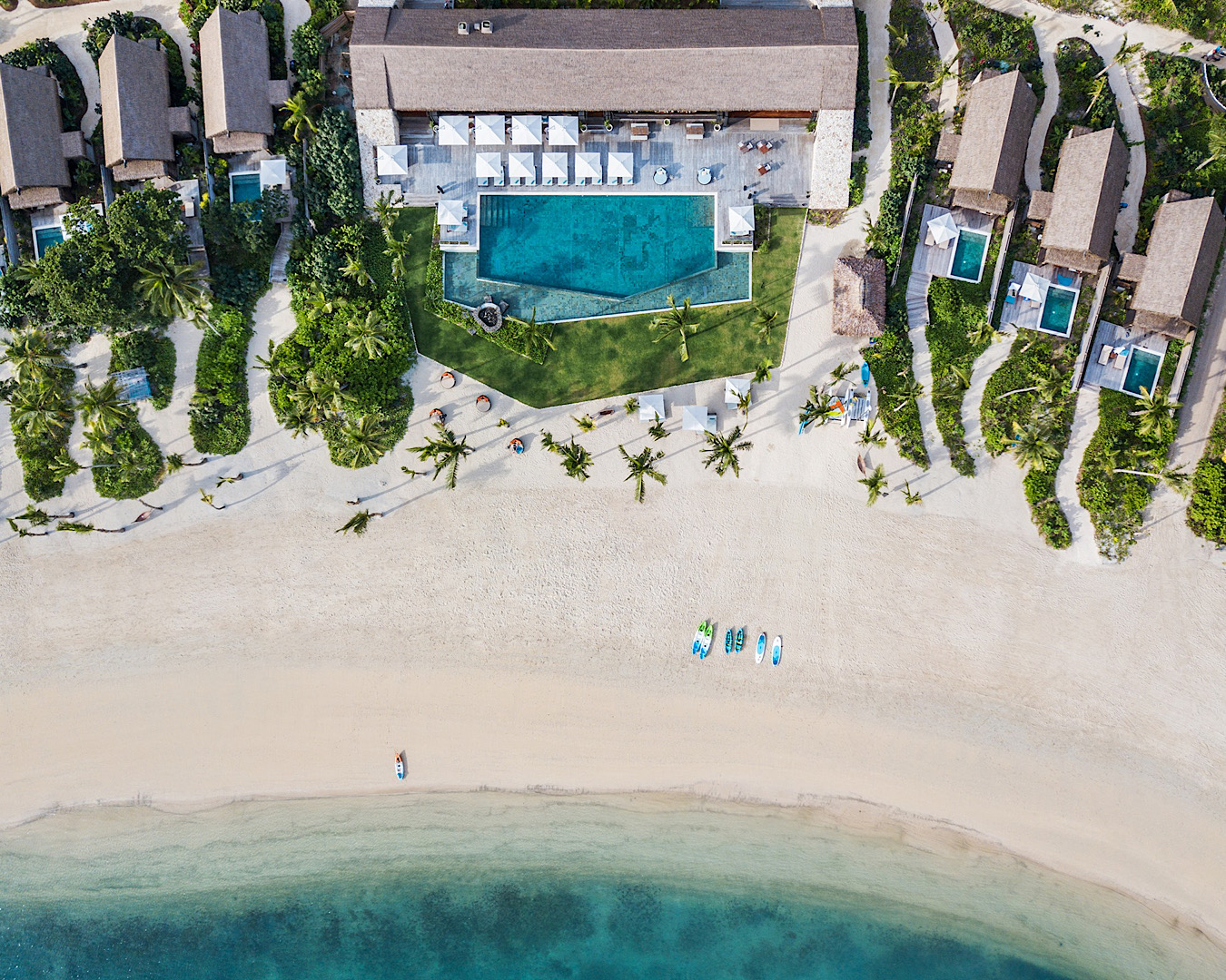 Luxury bures  at Six Senses Fiji have private pathways to the white sand beaches of Malolo Island. 