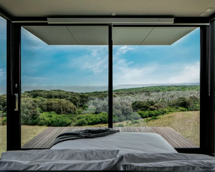 The view of the ocean from bed at Sky Pod One best Airbnbs Victoria
