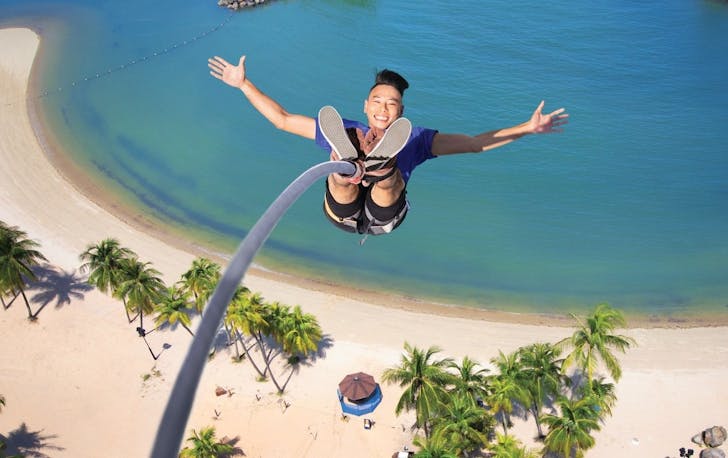 A person doing a bungee jump at Skypark Sentosa