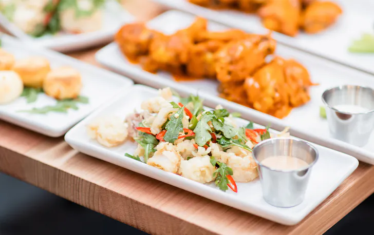 several plates of finger food