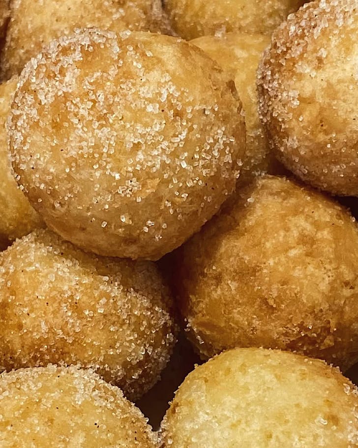 Fried round golden chapssal balls. 