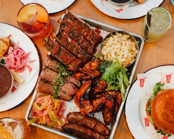 A platter laden with meat from Smoking Shack. 