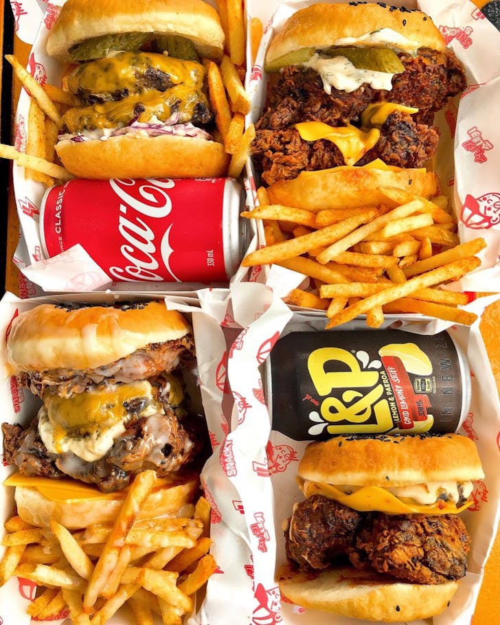 A selection of burgers and sides from Sneaky Snacky, one of the best burger joints in Auckland. 