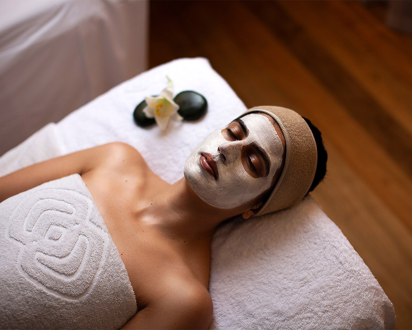 A person relaxes at Sofitel Spa, one of the best day spas in Auckland.