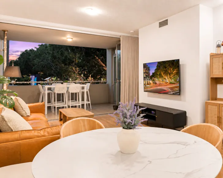 The living space and balcony at South Bank Two-Bedder best Brisbane Airbnbs