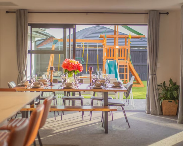 A view of the playground in the yard at Spacious Family Home best family friendly accommodation New Zealand