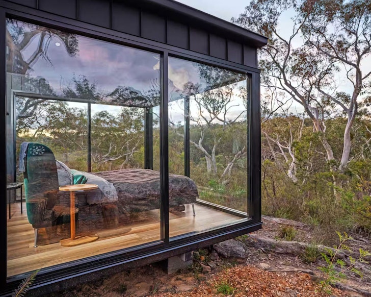 The bed with a bush view at Stag & Stone best farm stays NSW