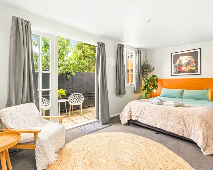 A view of the bedroom at Starry Night Retreat one of the best romantic Auckland stays