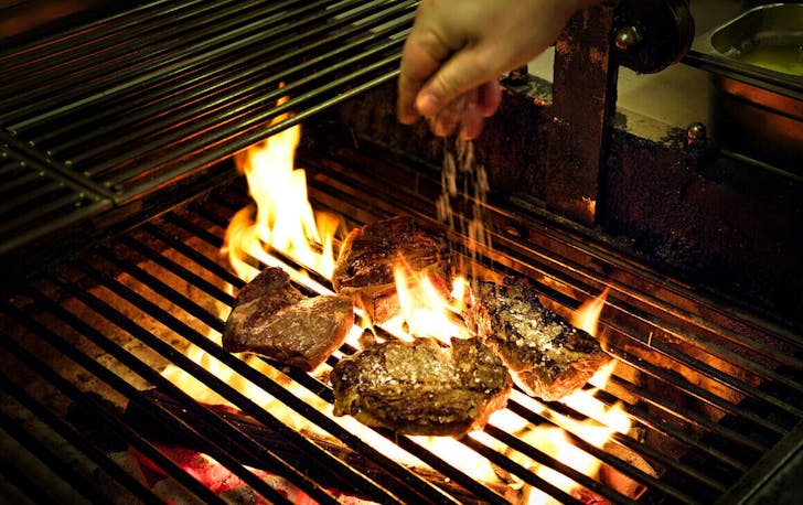Steaks on the grill at boCHINche