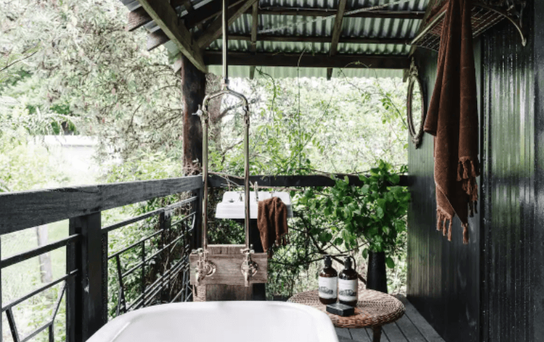 A deck with an outdoor bath at one of Victoria's best spa and outdoor bath Airbnb.