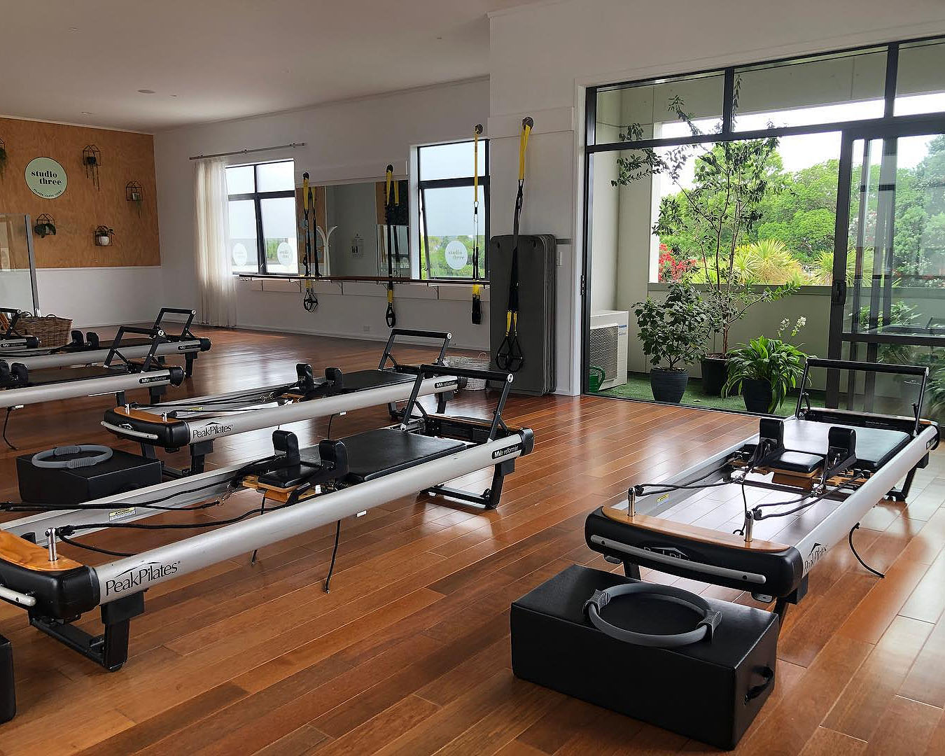 The light and airy space at Studio Three in Grey Lynn, all set up with pilates equipment.