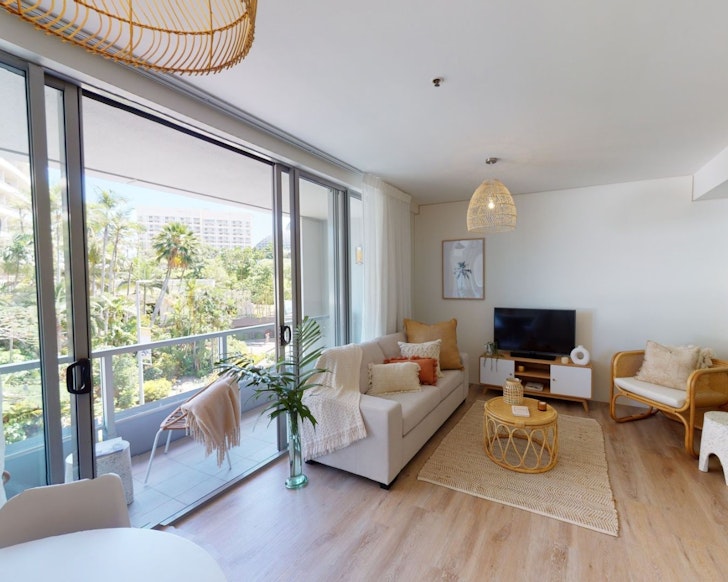 The living space at Stunning Waterfront Apartment best Airbnbs Cairns