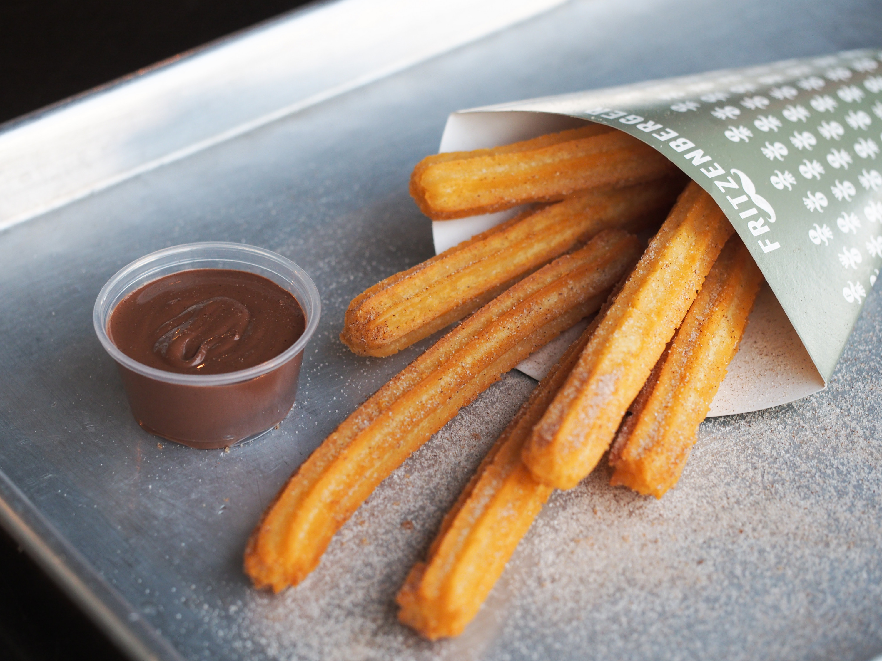 churros with a small pot of Nutella