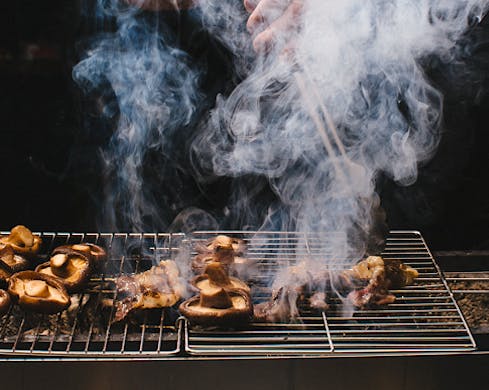 Grilling mushrooms and lots of smoke. 